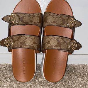Used coach sandals. Only worn once. Very good condition.